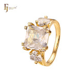 Solitaire big emeald cut colorful CZ sided with two white CZs 14K Gold engagement rings