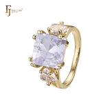 Solitaire big emeald cut colorful CZ sided with two white CZs 14K Gold engagement rings