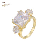 Solitaire big emeald cut colorful CZ sided with two white CZs 14K Gold engagement rings