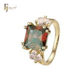 Solitaire big emeald cut colorful CZ sided with two white CZs 14K Gold engagement rings