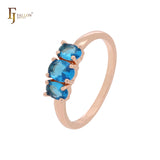 Triple cluster ocean blue CZs Rose Gold Engagement Rings