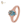 Oval solitaire clawed lake blue CZ Rose Gold two tone Engagement Rings