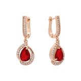 Solitaire teardrop and paved CZ Rose Gold earrings