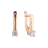 Rose Gold two tone solitaire white cz earrings with Deep Red Garnet stone