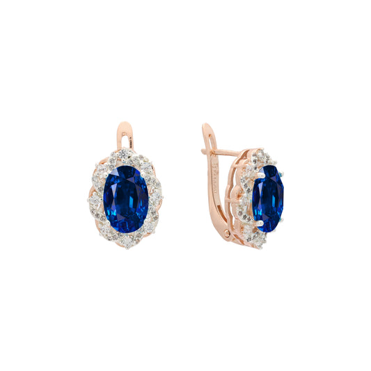 Rose Gold two tone earrings with Lake Blue stone