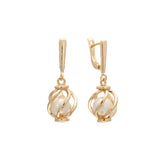 Rose Gold pearl in a cage earrings