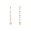 Beads and solitaire drop huggie earrings plated in 14K Gold two tone color