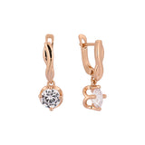 Aretes colgantes de oro rosa con solitario