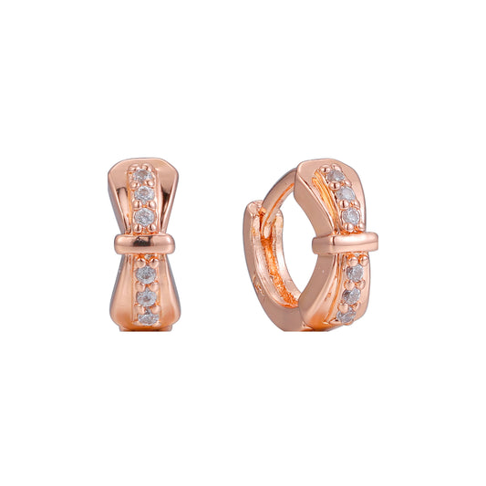 Aretes de cinta huggie de oro rosa