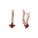 Aretes flor solitaria en colores baño de Oro 14K, Oro Blanco, Oro Rosa